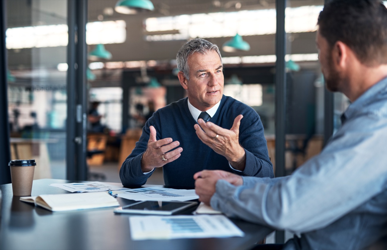 Insurance professional helping a customer complete documentation